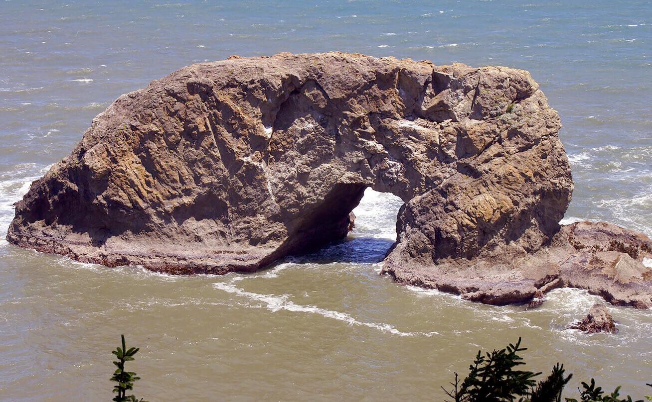 Photo of a rock formation in the ocean