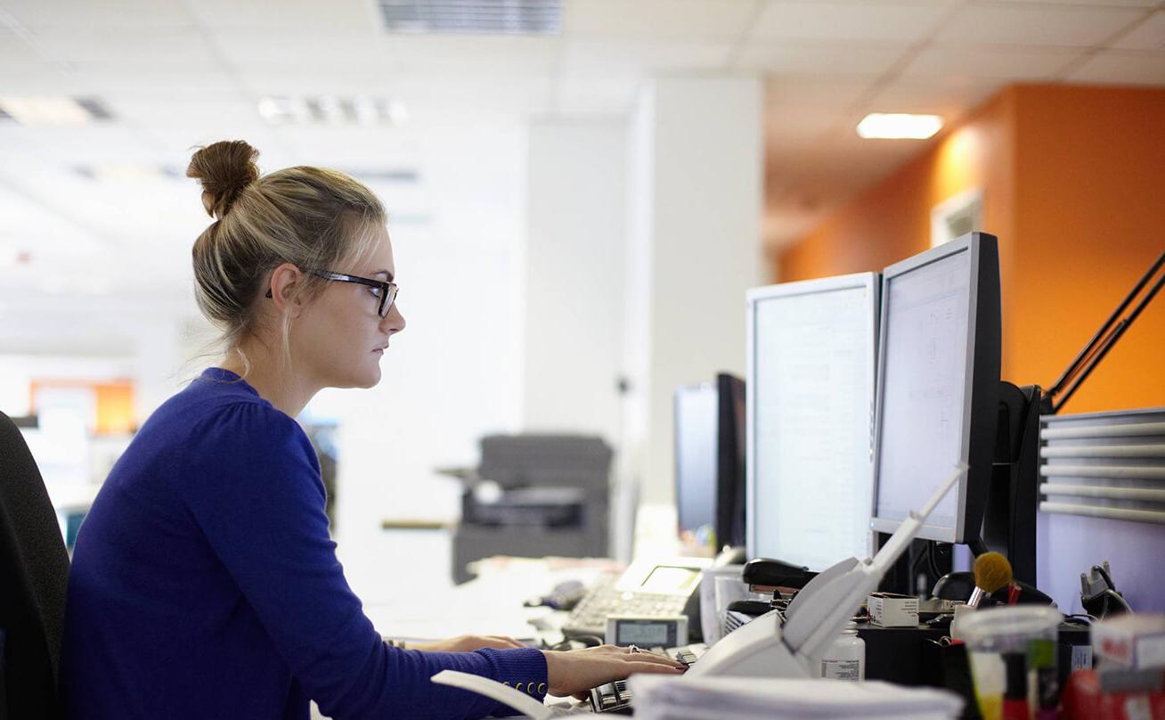 Photo of a student working on a computer